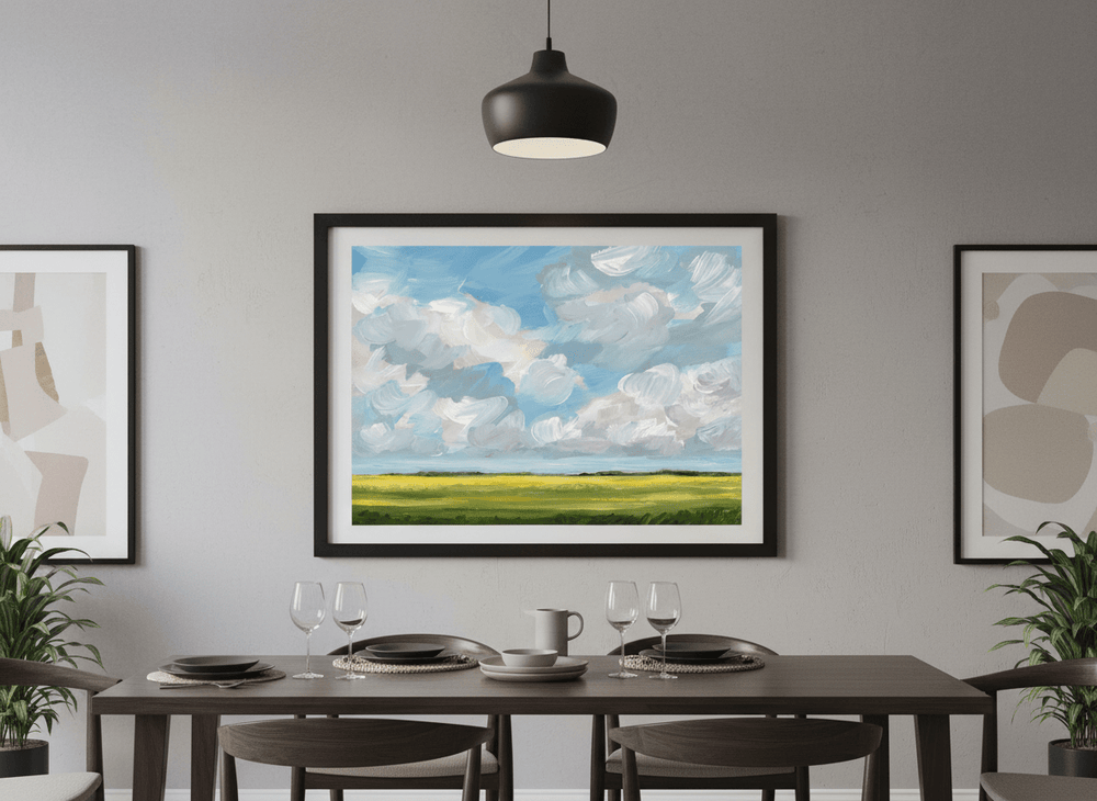 Wall art styled above a dining table in a contemporary home