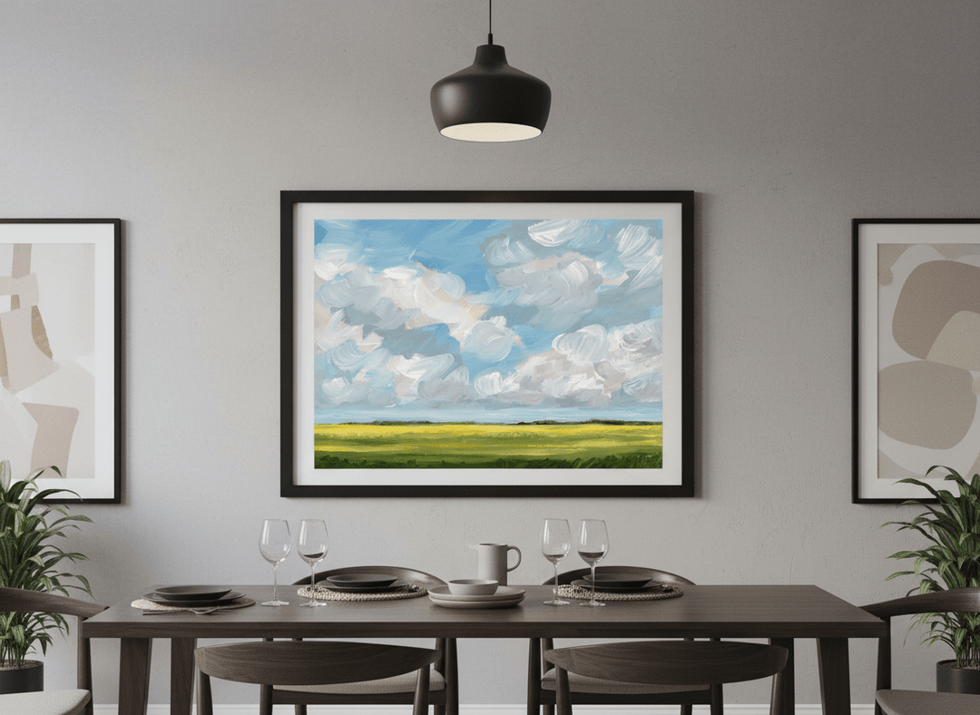 Wall art styled above a dining table in a contemporary home