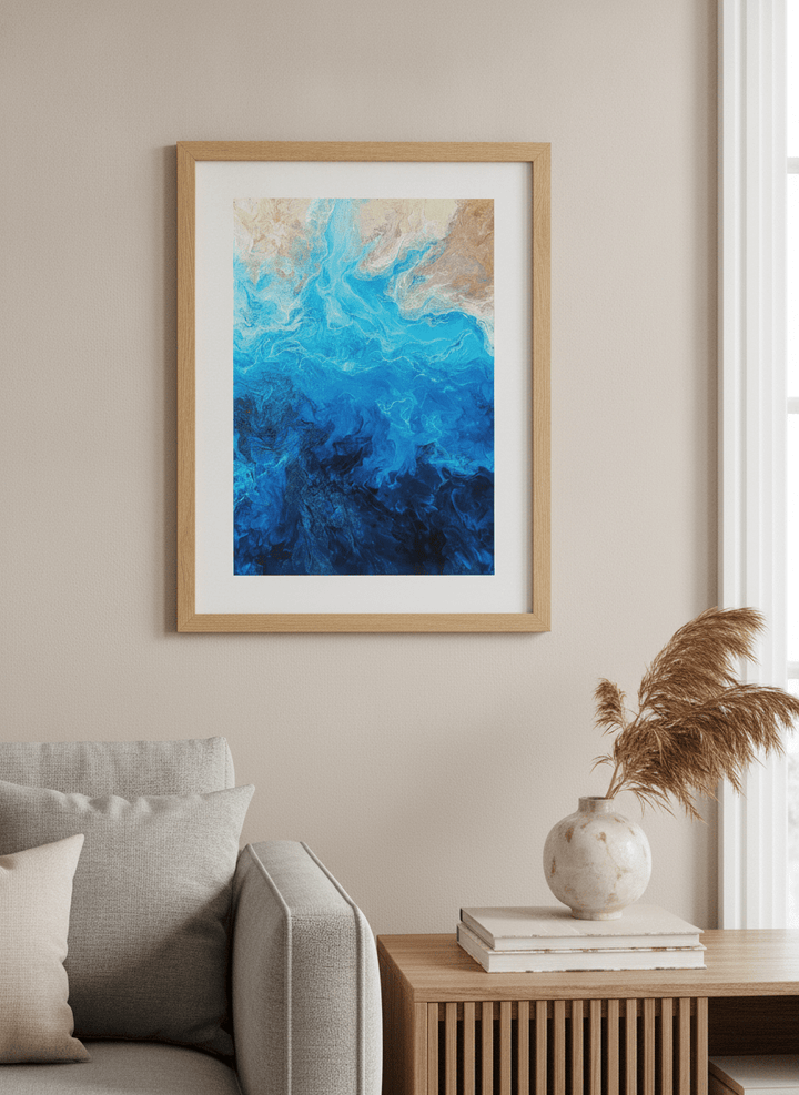 Modern wall art styled above a sofa in a neutral living room