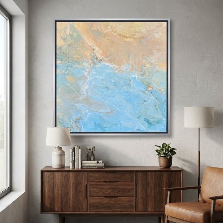 Canvas wall art with a silver leaf surround styled in a bright modern office