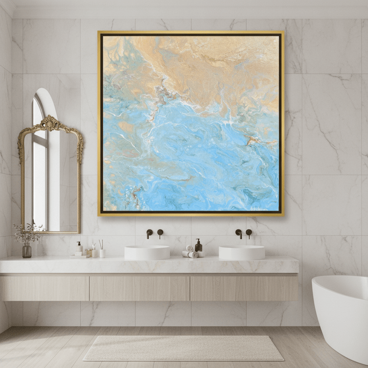 Oversized statement canvas wall art with a gold leaf surround styled in a clean minimalist bathroom