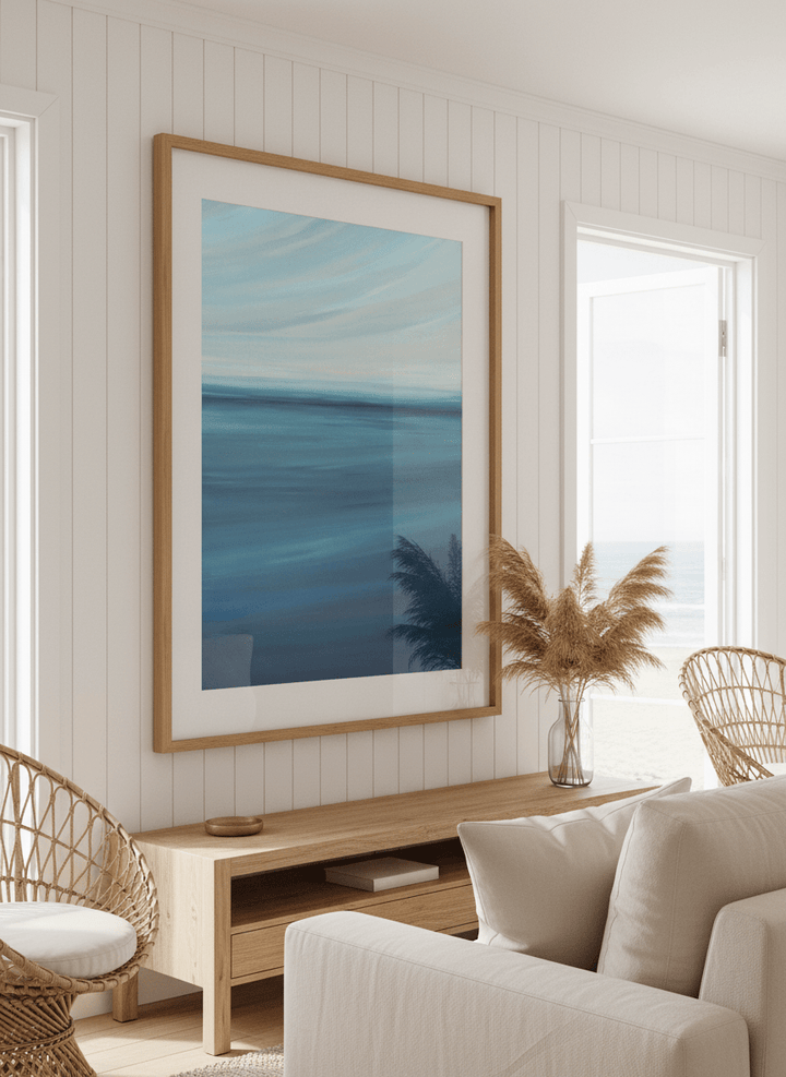 Neutral wall art displayed in a sunny coastal beach house