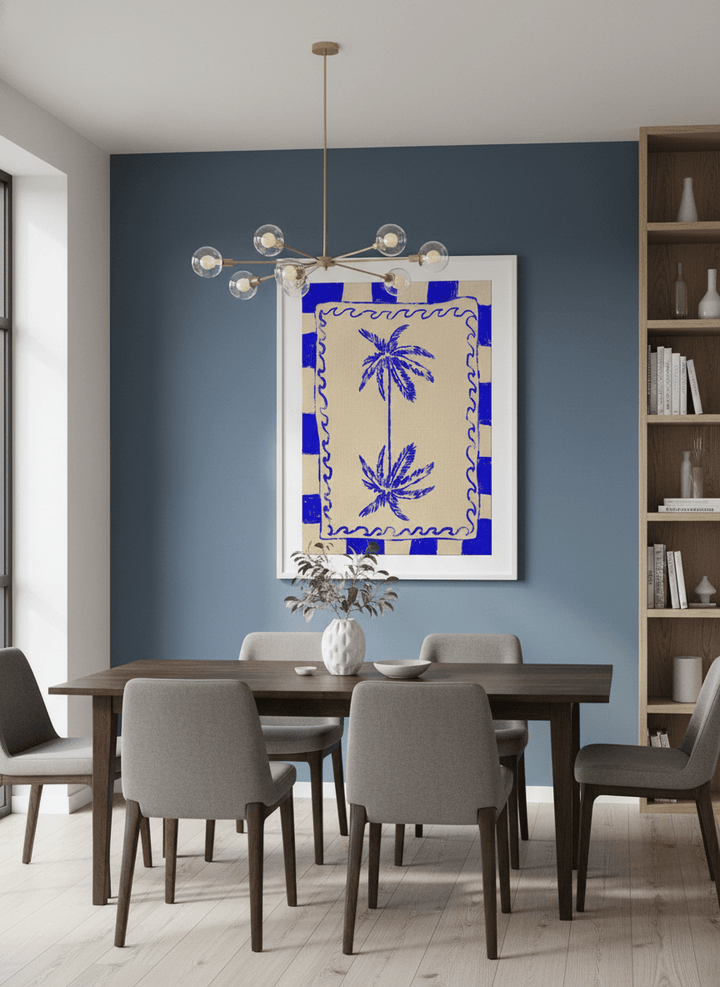Wall art styled above a dining table in a contemporary home
