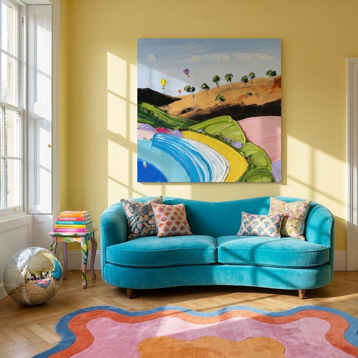 Stretched canvas wall art styled on the wall in a colourful eclectic living room