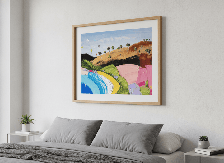 Minimalist artwork displayed in a calm, light-filled bedroom interior