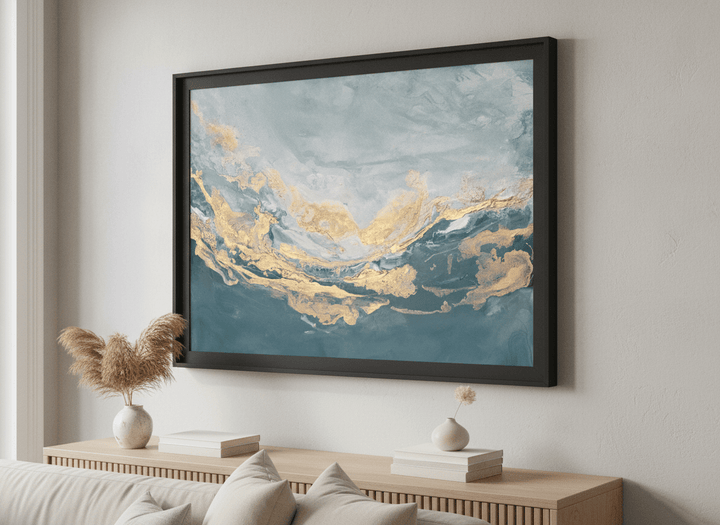 Modern wall art styled above a sofa in a neutral living room