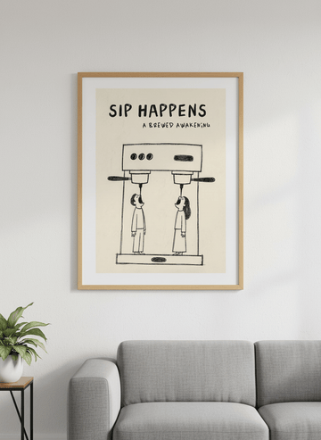 Modern wall art styled above a sofa in a neutral living room