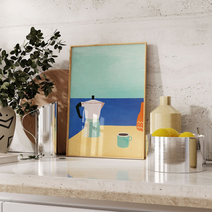 artwork on a kitchen counter with bowl of lemons