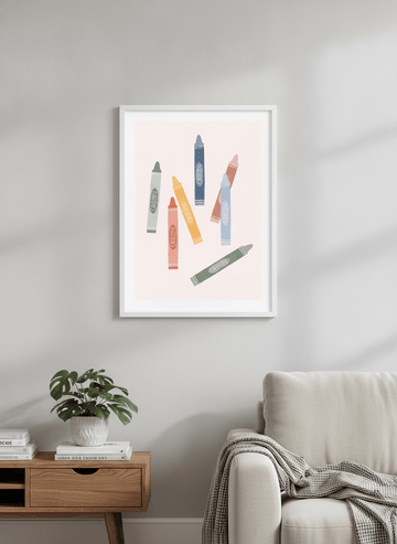 Modern wall art styled above a sofa in a neutral living room