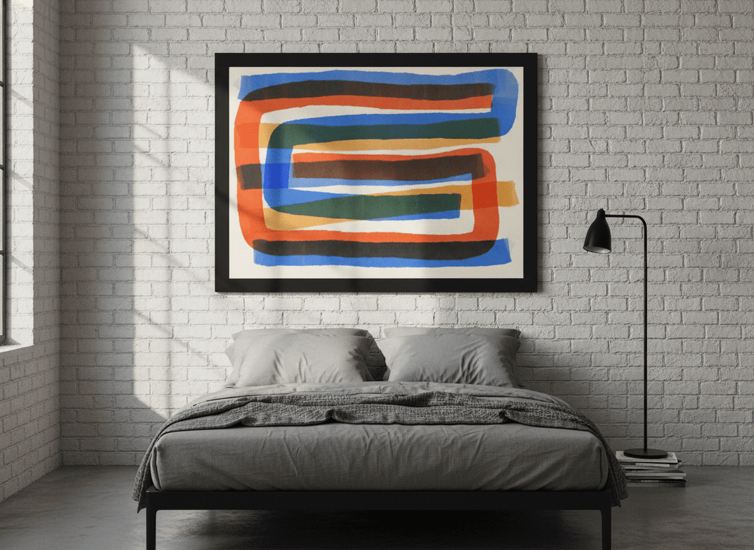 Modern wall art print styled on the wall in an industrial loft bedroom