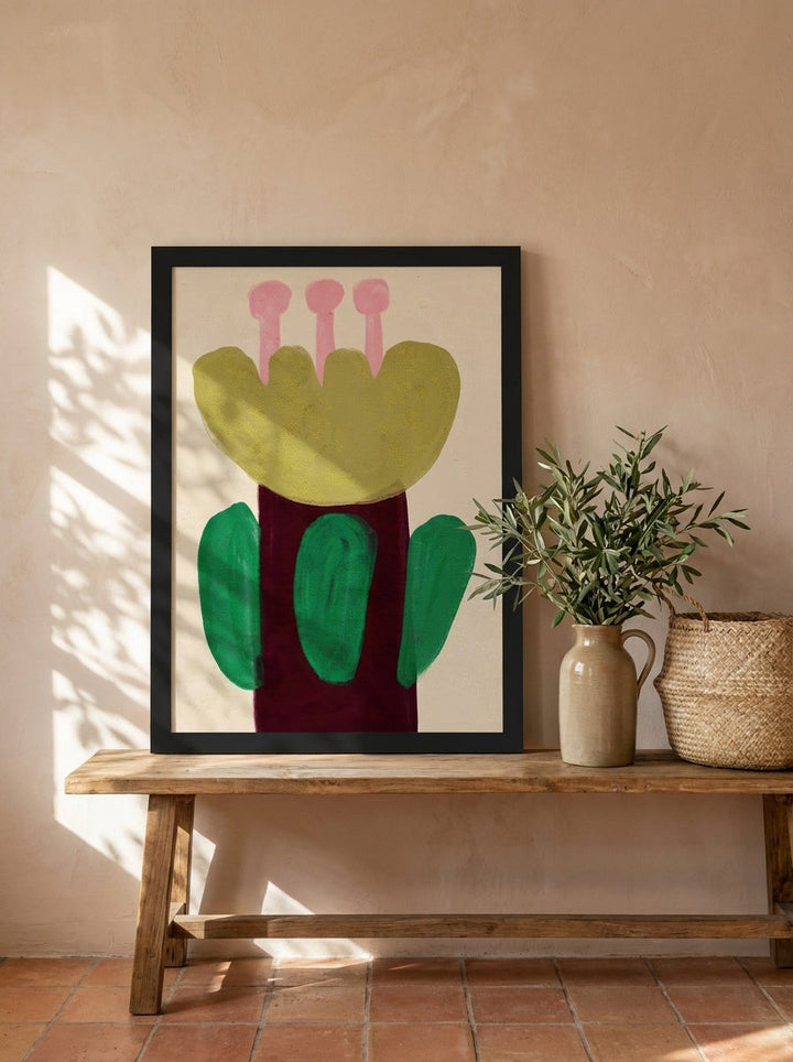 Modern wall art print standing on a bench in a Mediterranean bedroom