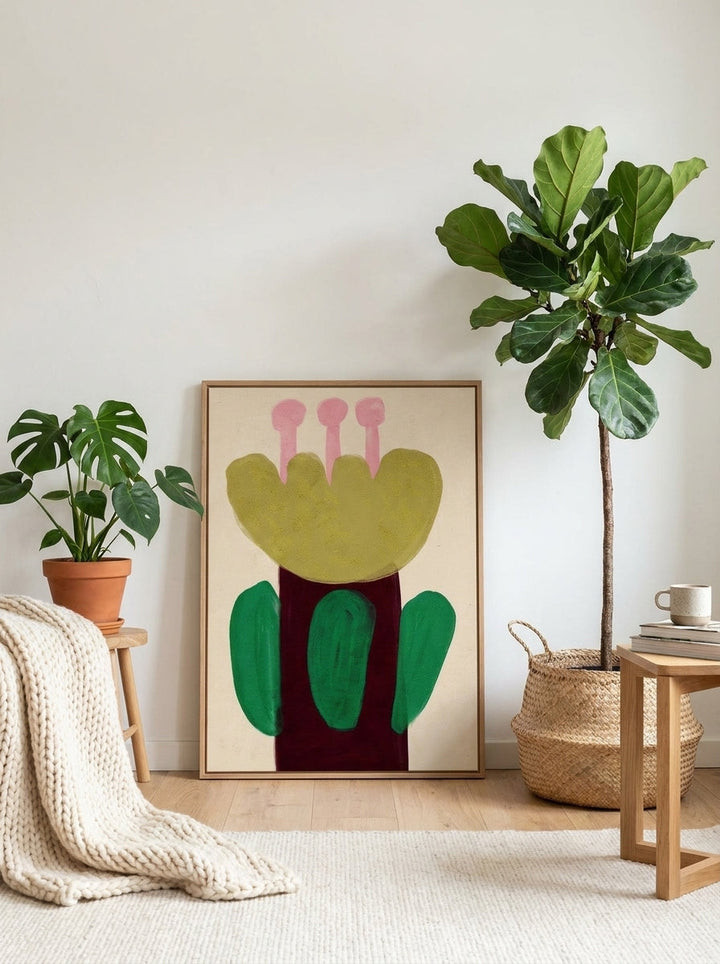 Modern wall art print leaning against the wall in a bright Scandinavian home office
