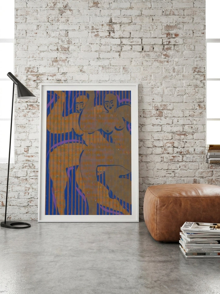 Modern wall art print leaning against the wall in an industrial loft living room