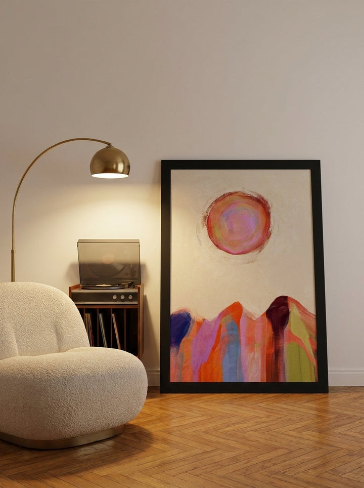 Oversized statement modern wall art print leaning against the wall in a mid-century dining room