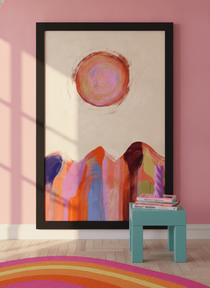 Modern wall art print standing on a side table in a colourful eclectic bedroom