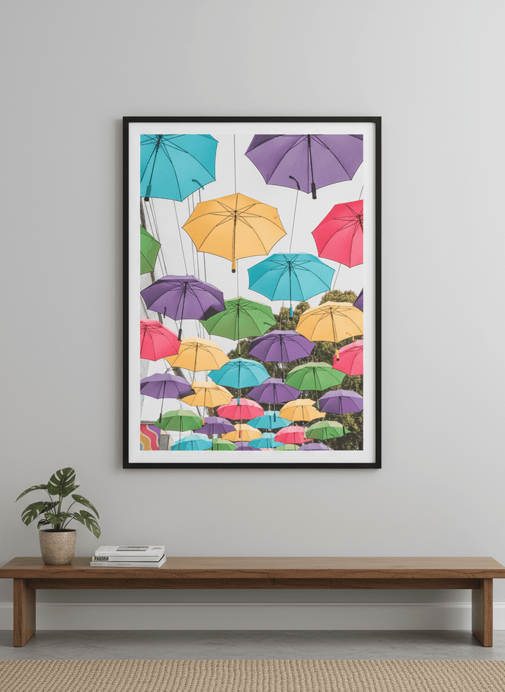Modern wall art styled above a sofa in a neutral living room
