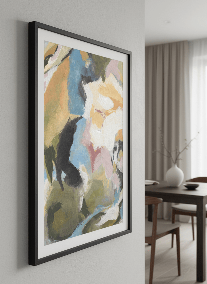 Wall art styled above a dining table in a contemporary home