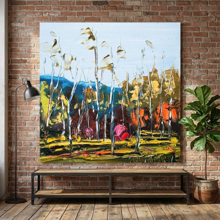 Stretched canvas wall art styled on the wall in an industrial loft living room