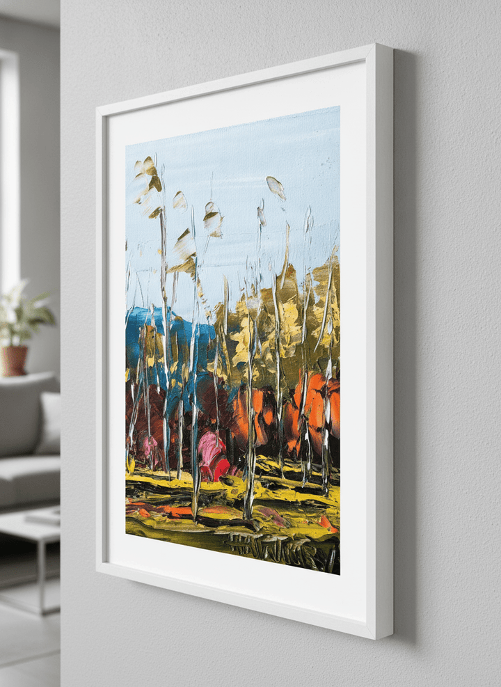 Modern wall art styled above a sofa in a neutral living room