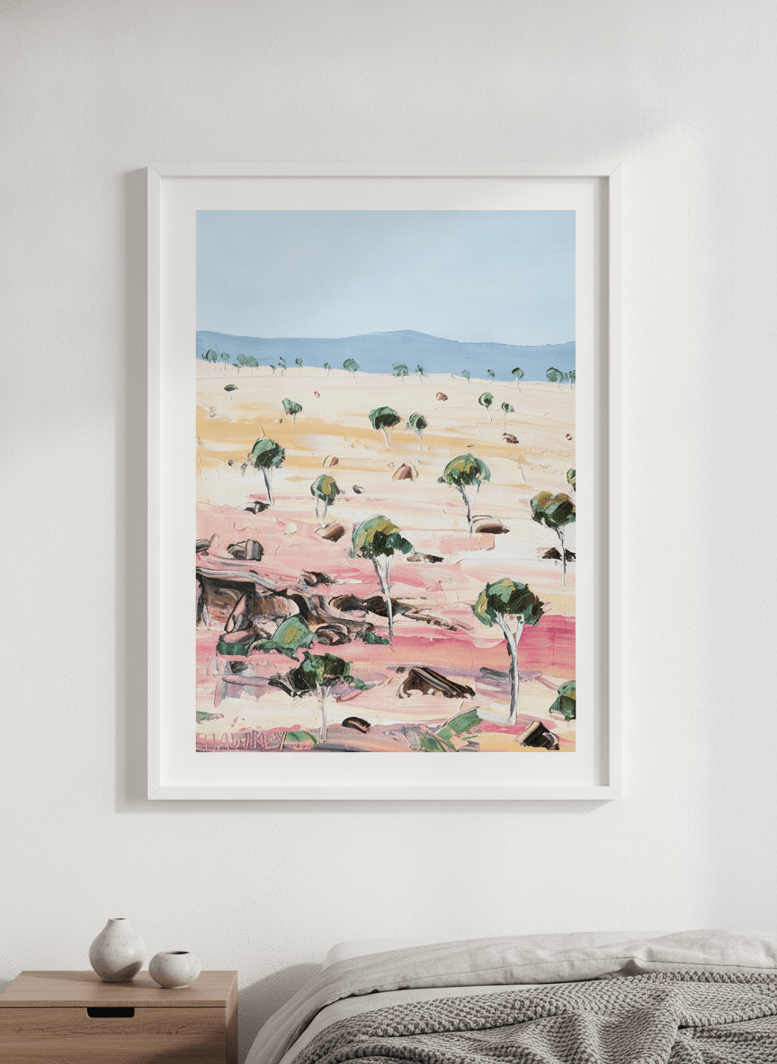 Minimalist artwork displayed in a calm, light-filled bedroom interior