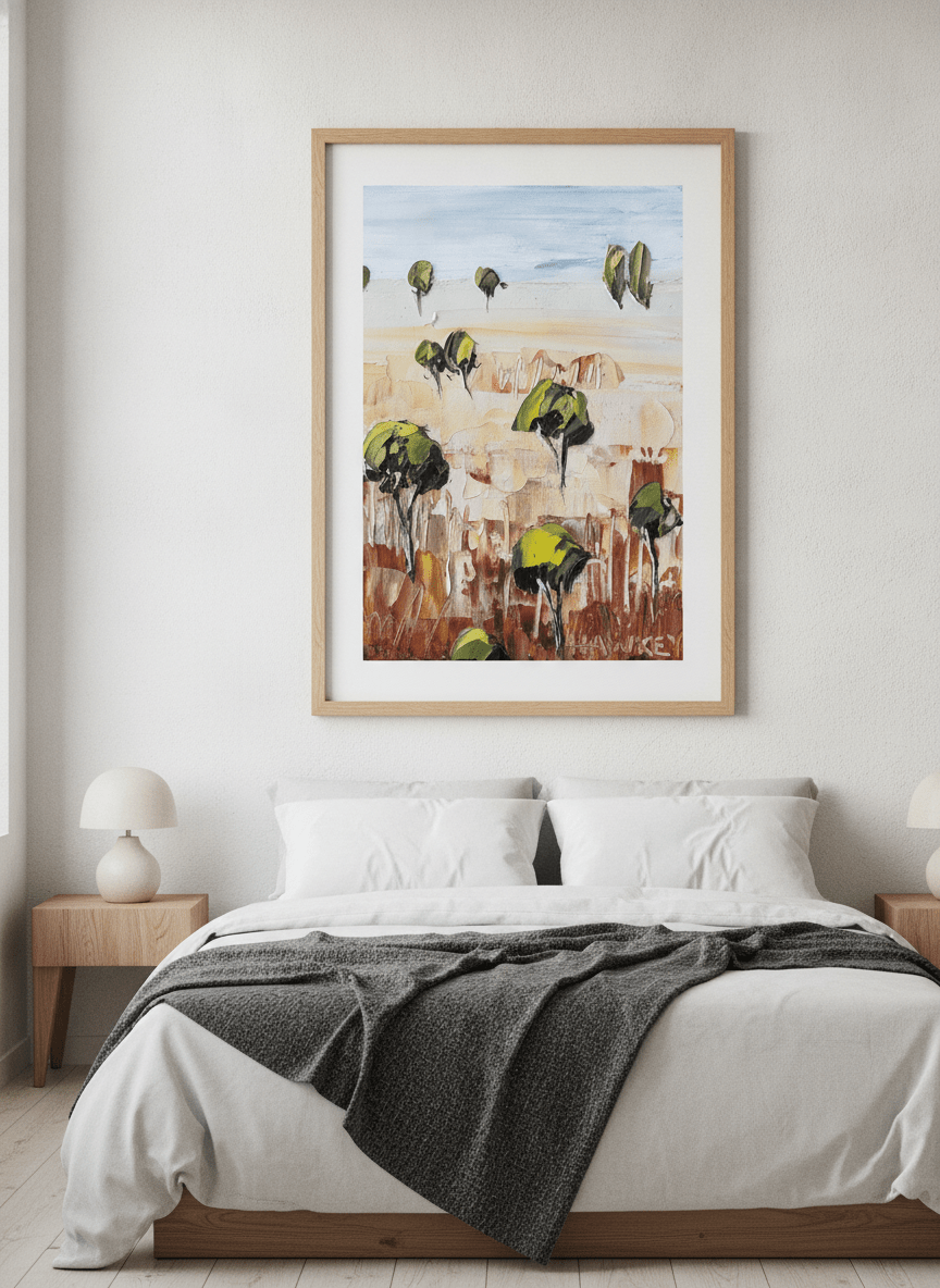 Minimalist artwork displayed in a calm, light-filled bedroom interior