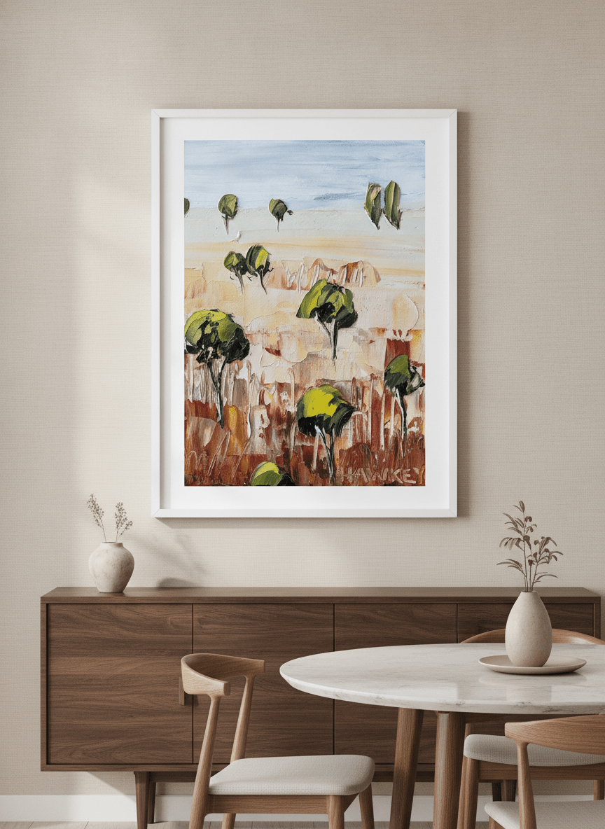 Wall art styled above a dining table in a contemporary home
