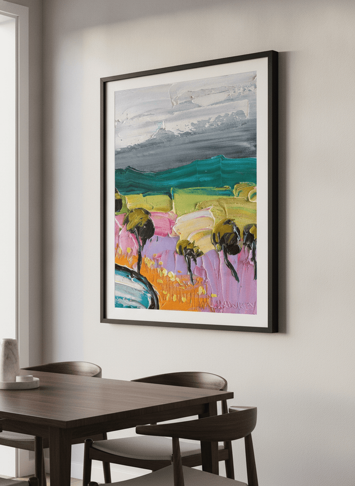 Wall art styled above a dining table in a contemporary home