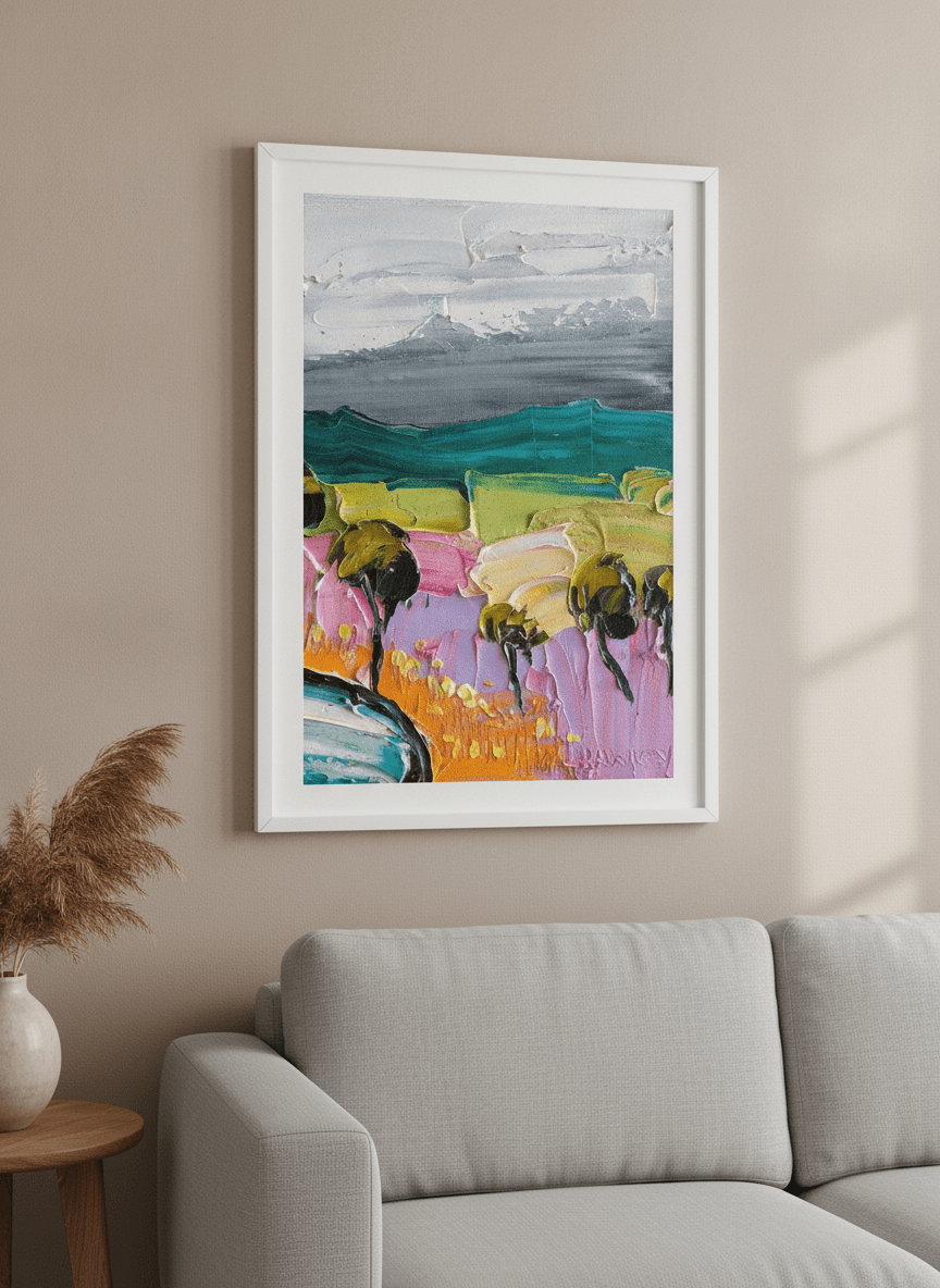 Modern wall art styled above a sofa in a neutral living room