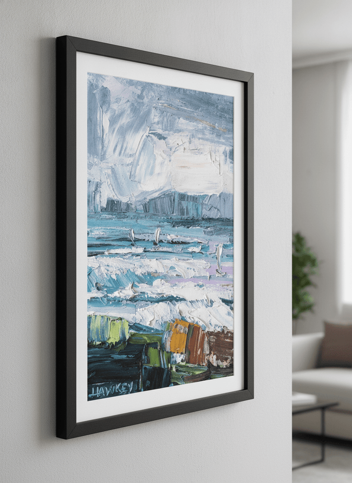 Modern wall art styled above a sofa in a neutral living room