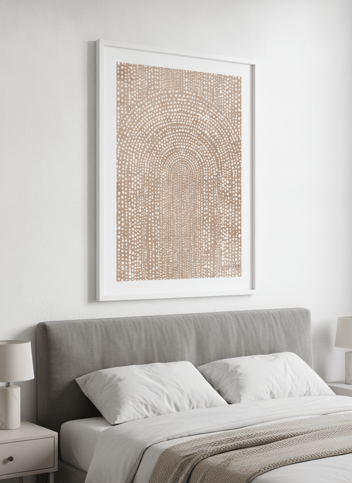 Minimalist artwork displayed in a calm, light-filled bedroom interior
