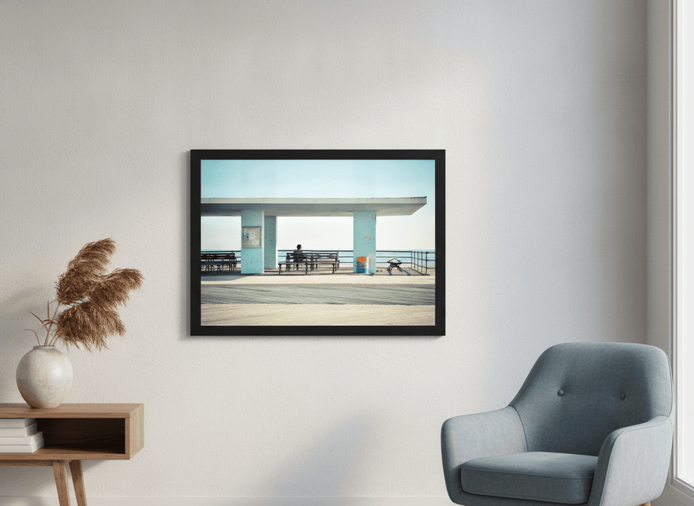 Modern wall art styled above a sofa in a neutral living room