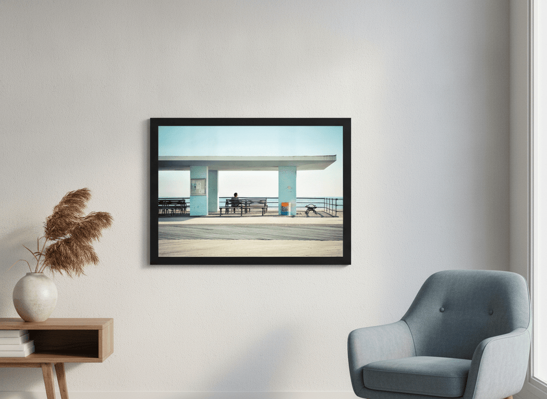 Modern wall art styled above a sofa in a neutral living room