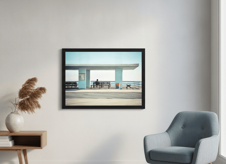 Modern wall art styled above a sofa in a neutral living room