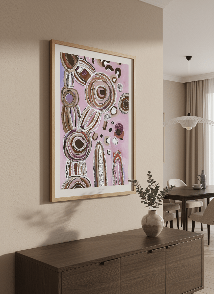 Wall art styled above a dining table in a contemporary home