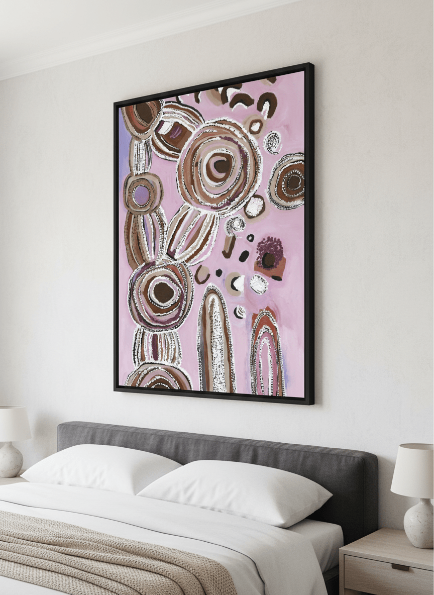 Minimalist artwork displayed in a calm, light-filled bedroom interior