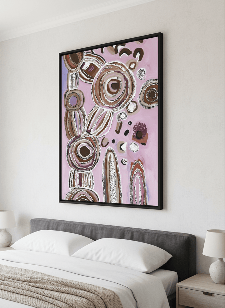Minimalist artwork displayed in a calm, light-filled bedroom interior