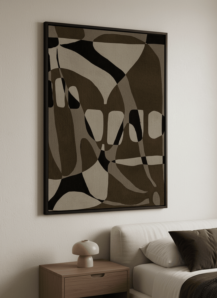 Minimalist artwork displayed in a calm, light-filled bedroom interior