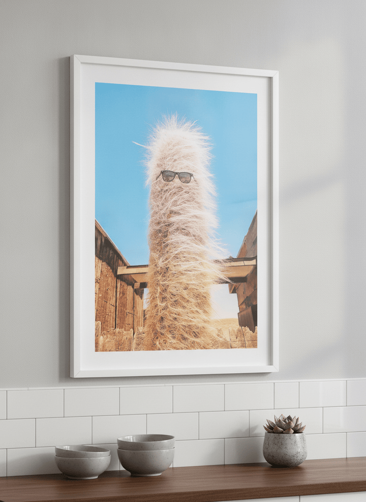 Artwork styled on the wall of a bright modern kitchen