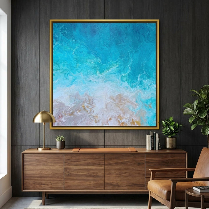 Canvas wall art with a gold leaf surround styled in a bright modern office