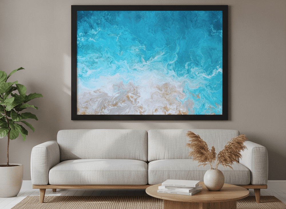Modern wall art styled above a sofa in a neutral living room