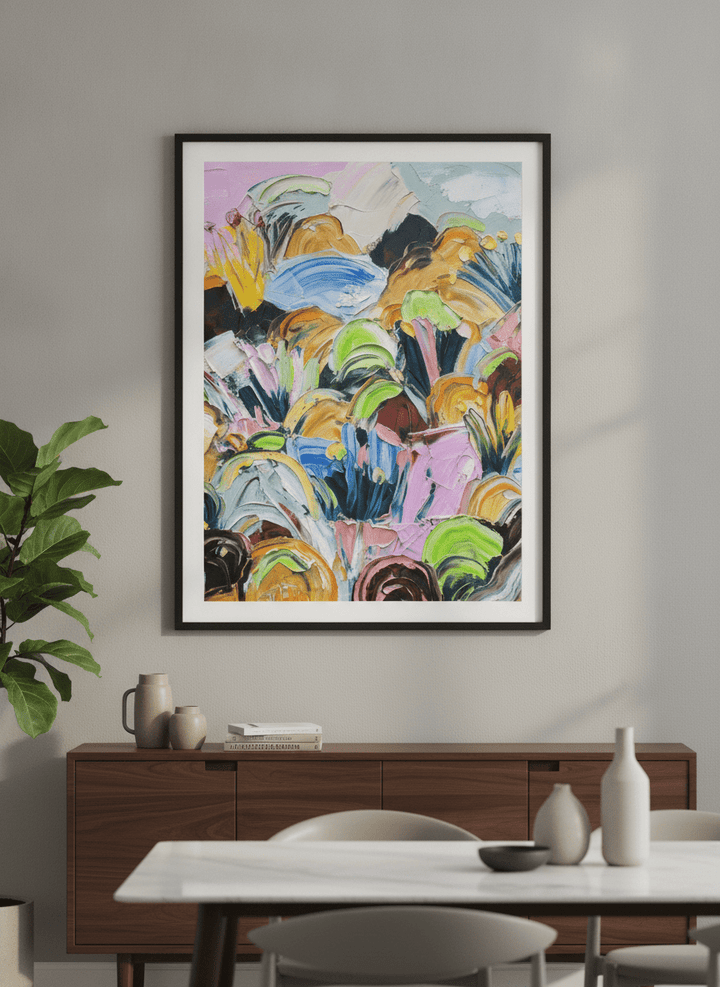 Wall art styled above a dining table in a contemporary home