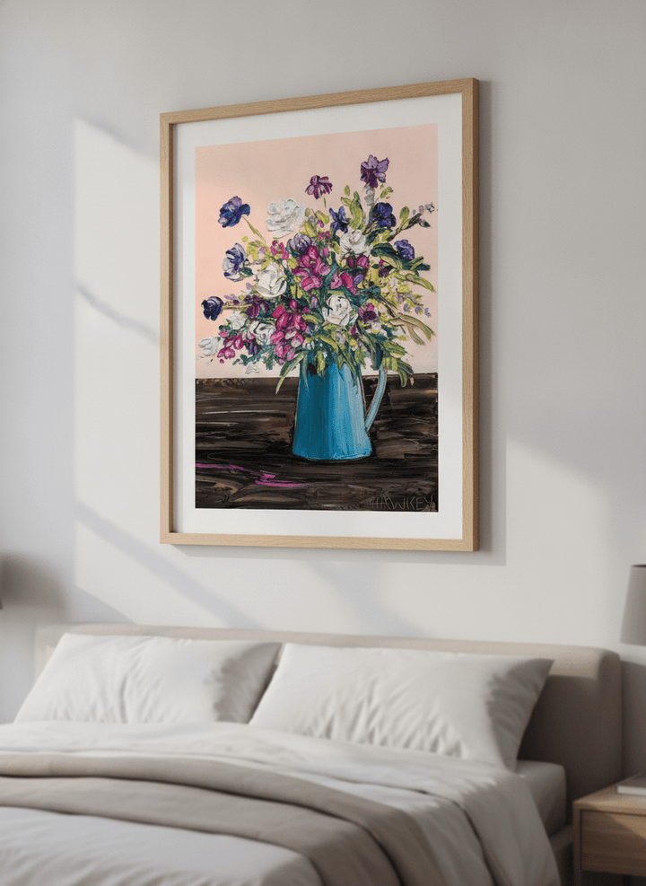 Minimalist artwork displayed in a calm, light-filled bedroom interior