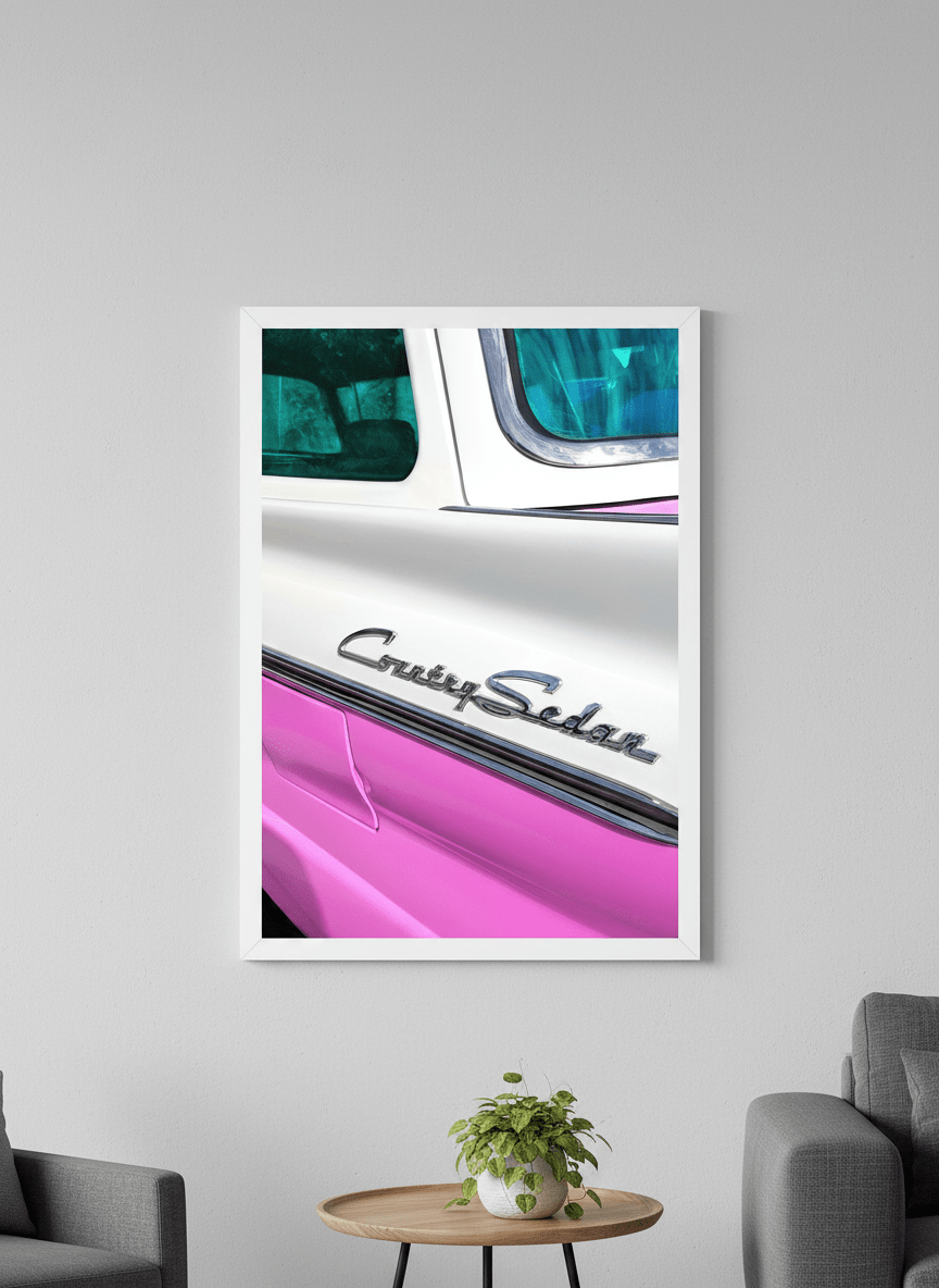Modern wall art styled above a sofa in a neutral living room