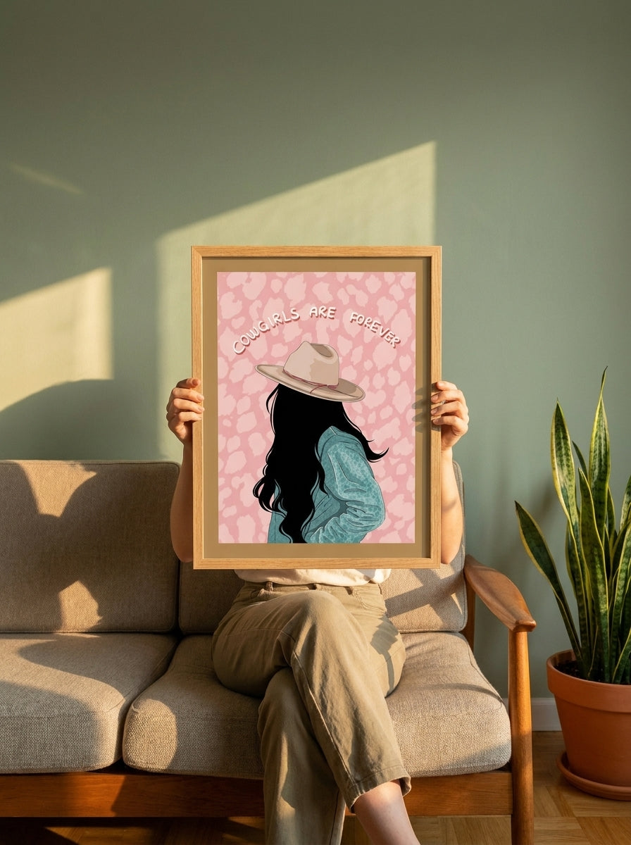 Person holding modern wall art print in a mid-century living room