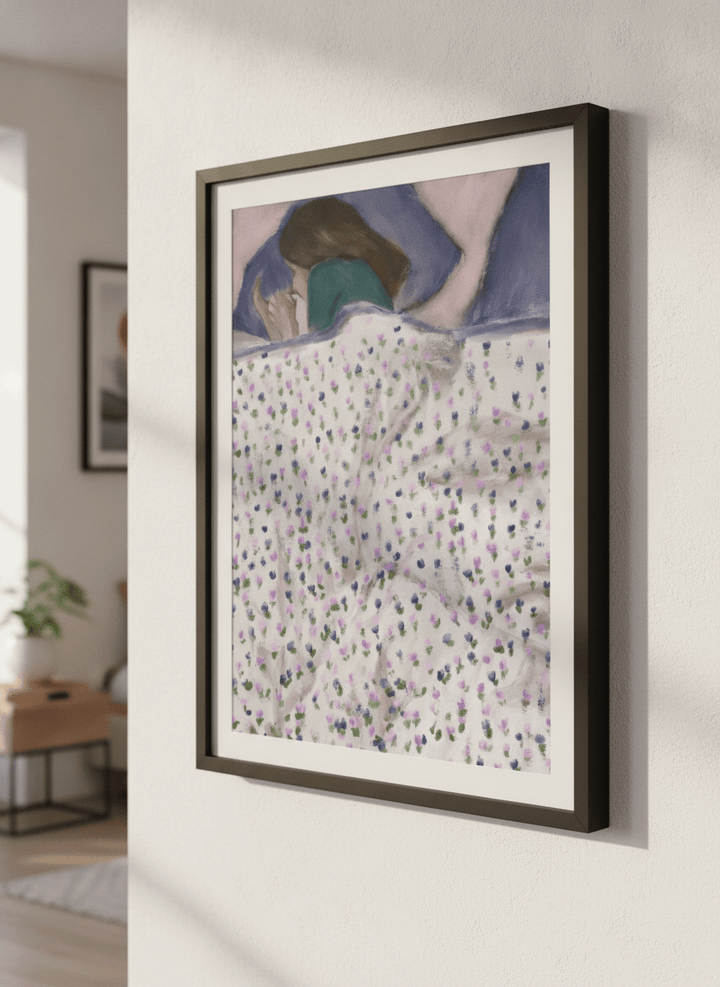 Minimalist artwork displayed in a calm, light-filled bedroom interior