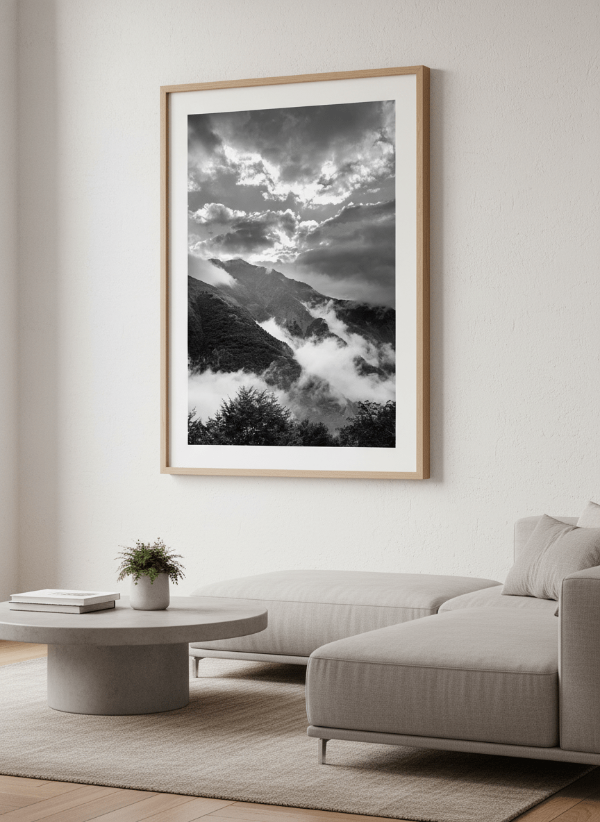 Modern wall art styled above a sofa in a neutral living room