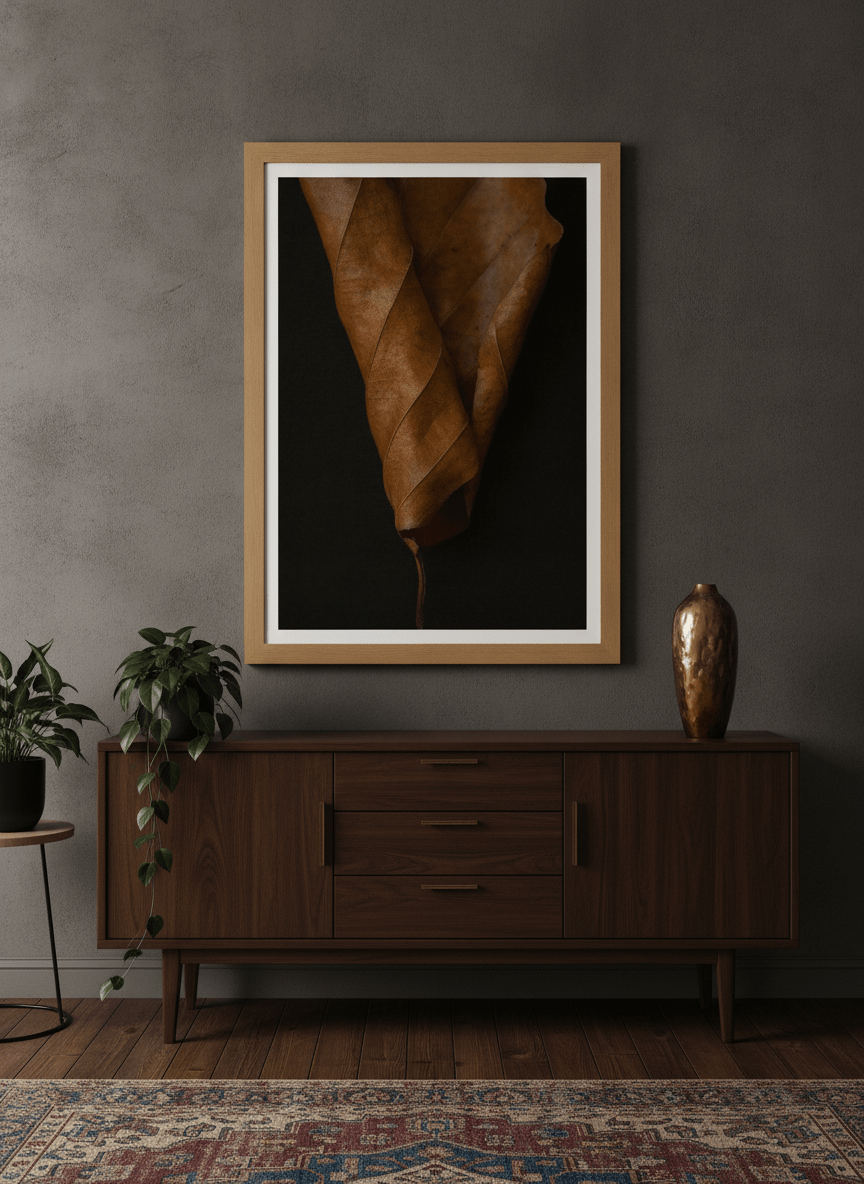 Modern wall art print styled on the wall in a moody living room