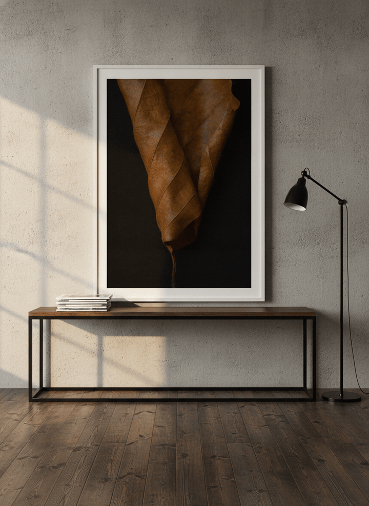Modern wall art print standing on a console in an industrial loft home office