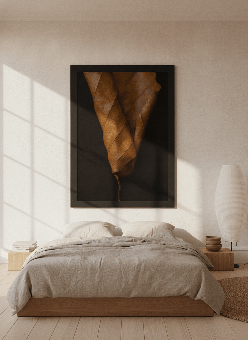 Oversized statement modern wall art print styled on the wall in a warm Japandi bedroom