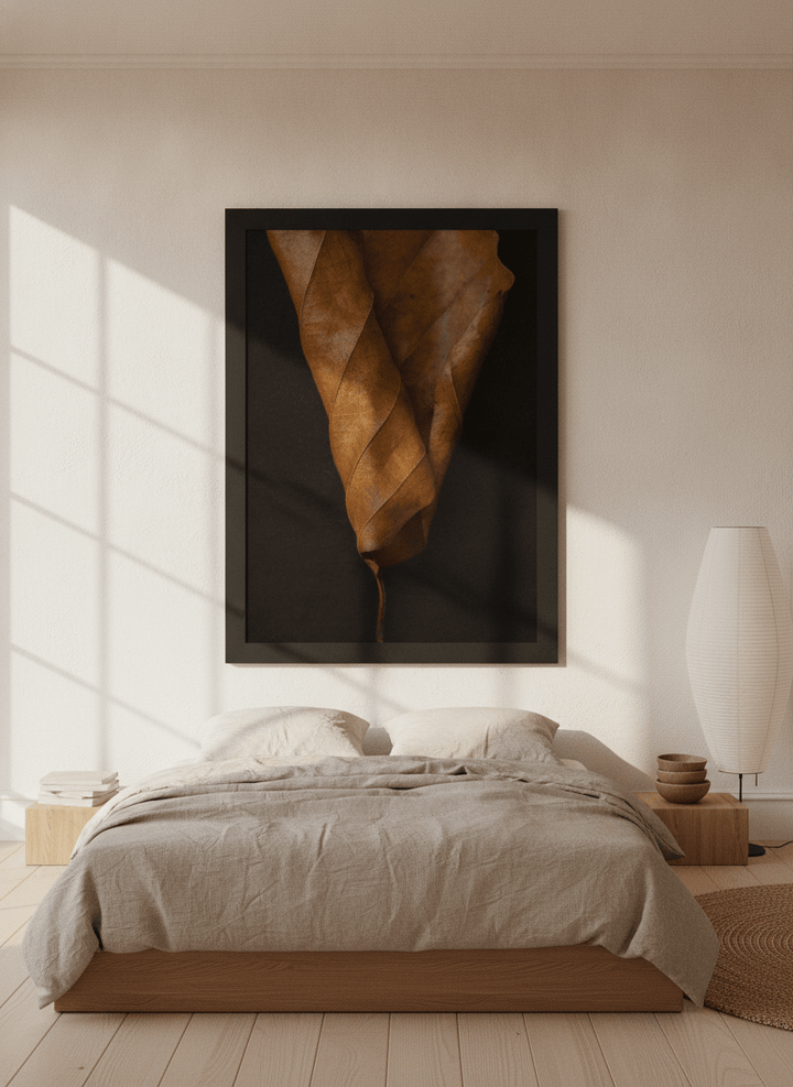 Oversized statement modern wall art print styled on the wall in a warm Japandi bedroom